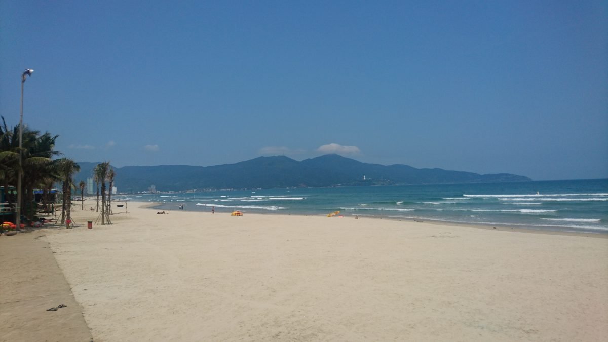 The view from My Khe beach looking north to the Son Tra peninsula with the huge, Lady Buddha statue just visible