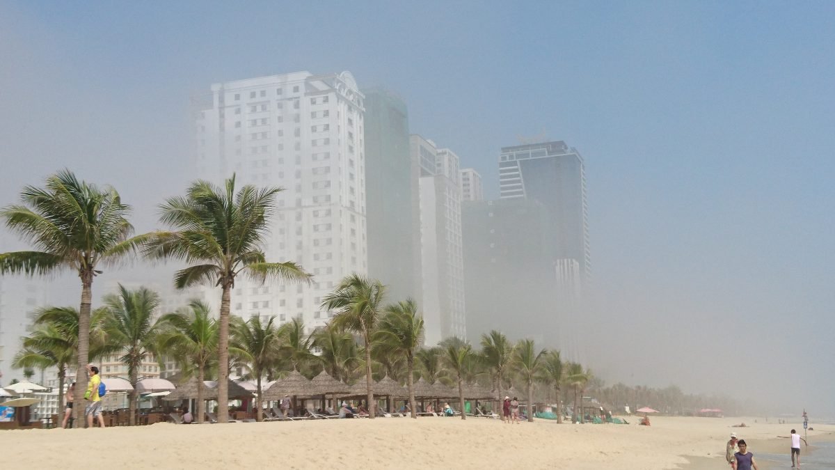 The morning sun burning off the remains of a heavy sea mist from the previous evening on My Khe beach