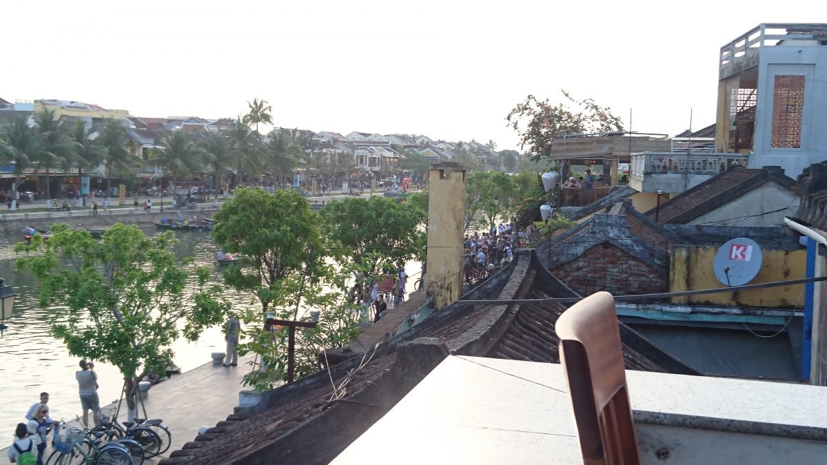 Dinner on a terrace overlooking the Thu Bon river