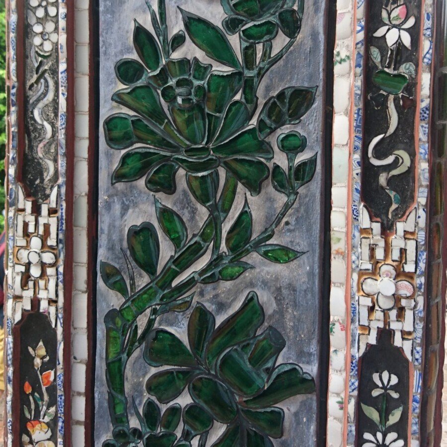 This detail from one of the pillars of the Emperor's Reading Room shows how the designs are made from a mosaic of broken and painted pottery