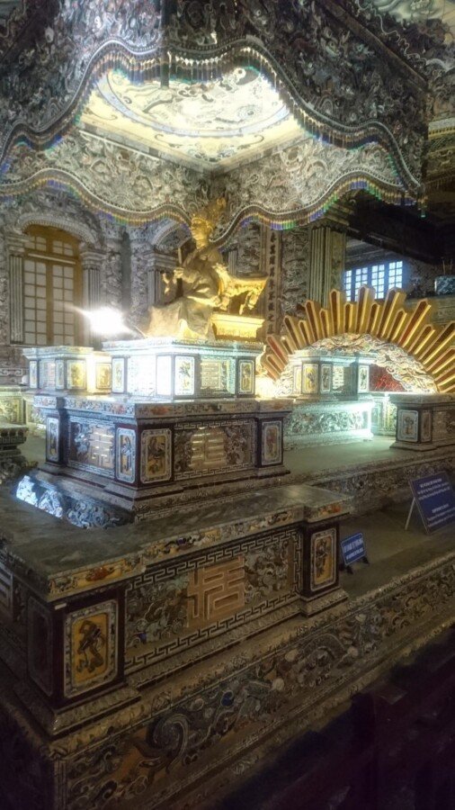 This spectacular tomb is topped with a gilt statue of Khai Dinh which was cast in Marseille