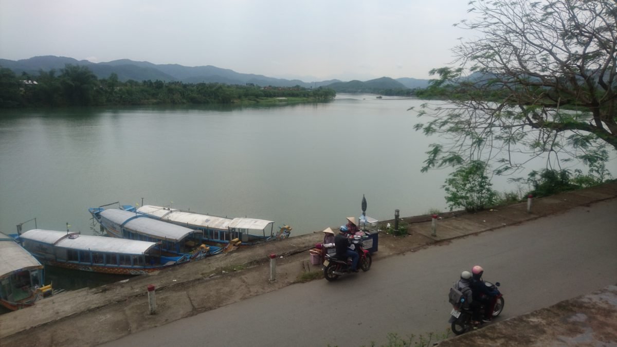 The Perfume River is so-called because in the autumn, flowers from orchards upriver of Hue, fall onto the water and give it their scent
